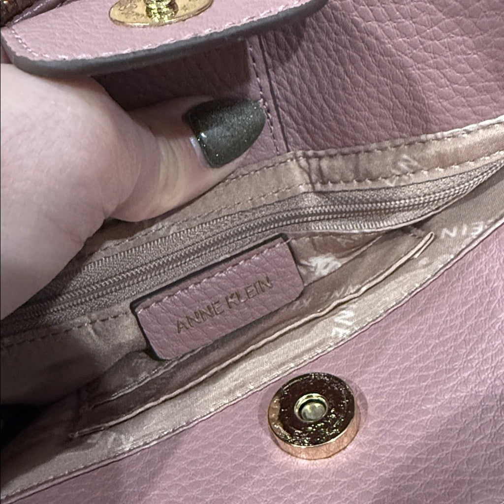 Anne Klein Textured Dome Crossbody Bag in a Mauve / Pink