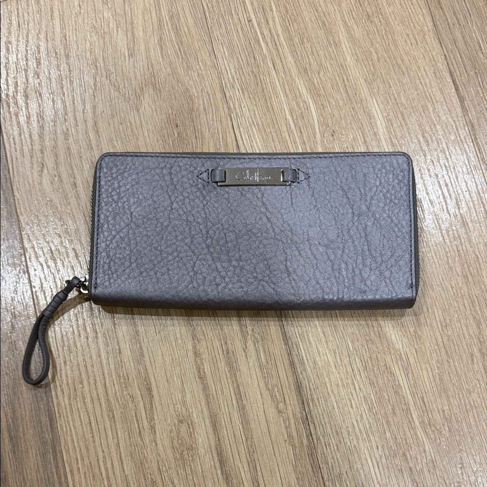 Cole Haan Zip Around Continental Wallet in a Gray Color Pallet